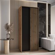 Kleiderschrank Mina mit Schiebetüren in Eiche/Schwarz gehalten, viel Stauraum, Lamellen in Eichen Optik, Anti Staubbürsten, 235,2 x 120 x 60 cm