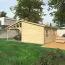 Einzelgarage mit Carport GR 78 | Fichten- und Kiefernholz | Grundfläche 42,31 m² | Holzgarage mit Anbaudach | Doppelflügeltor, Doppelfenster und Einzeltür