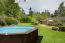 Holz-Pool Sunnydream 07, oval, 8,40 x 4,90 Meter, inklusive Premium Filteranlage,  Filtermedium, Poolleiter, Poolfolie, Boden- und Wandvlies, Edelstahl-Eckverbindungen