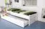 Kinderbett 90 x 200 cm mit Bettkasten als Gästebett oder Stauraum | Massivholz: Buche | Weiß Lackiert | inkl. 2. Liegeplatz 90 x 190 cm ausziehbar und 2 Rollrost Abbildung