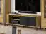 TV-Unterschrank Lassila 06, Farbe: Eiche Artisan / Schwarz - Abmessungen: 54 x 155 x 40 cm (H x B x T), mit zwei Türen und vier Fächern