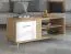 Stabiler Couchtisch mit zwei Türen Baka 04, drei Fächer, Farbe: Eiche Artisan / Weiß Hochglanz, ABS, MDF, Maße: 54 x 120 x 60 cm, modernes Design