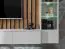 Außergewöhnliche Wohnwand Kinn 05, Farbe: Dunkelblau / Eiche - Abmessungen: 162 x 210 x 40 cm (H x B x T), mit genügend Stauraum