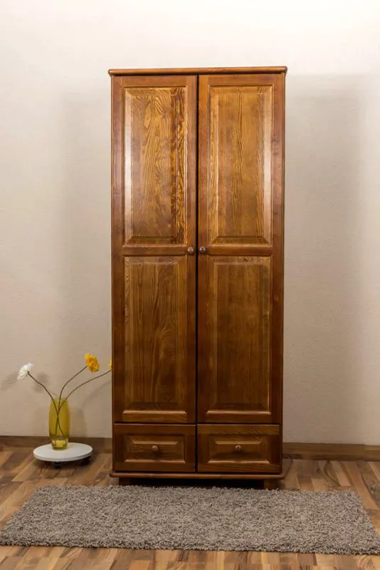 Kleiderschrank | 2 Drehtüren | 2 Schubladen | 1 Fach | mit Kleiderstange | 80 cm breit | Massivholz | Farbe: Eiche Abbildung