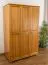 Kleiderschrank | 3 Drehtüren | 4 Fächer | mit Kleiderstange | 120 cm breit | Massivholz | Farbe: Erle Abbildung