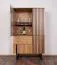 Vitrine Slatina 06, Farbe: Eiche / Schwarz, teilmassiv - Abmessungen: 146 x 91 x 45 cm (H x B x T)