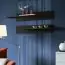 Außergewöhnliche Wohnwand Hompland 60, Farbe: Schwarz - Abmessungen: 170 x 320 x 40 cm (H x B x T), mit blauer LED-Beleuchtung